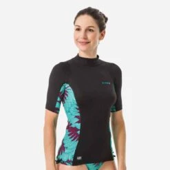 Tee Shirt Anti UV Surf Top 500 Manches Courtes Femme Parme Et Floral SELVA 17 Tee Shirt Anti UV Surf Top 500 Manches Courtes Femme Parme Et Floral SELVA -ProSportif Boutique 8518978