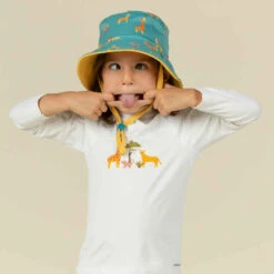 Chapeau Anti UV Bébé Réversible Jaune Et Bleu Imprimé SAVANE -ProSportif Boutique chapeau anti uv bebe reversible bleu et imprime palmiers 4