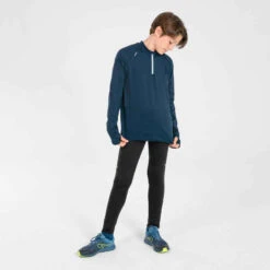 MAILLOT MANCHES LONGUES ENFANT 1/2 ZIP CHAUD - KIPRUN WARM BLEU MARINE -ProSportif Boutique maillot manches longues chaud 1slash2 zip enfant d athletisme at 100 bleu marine 6