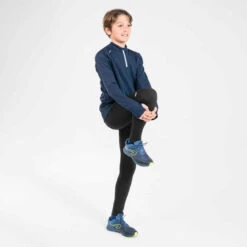 MAILLOT MANCHES LONGUES ENFANT 1/2 ZIP CHAUD - KIPRUN WARM BLEU MARINE -ProSportif Boutique maillot manches longues chaud 1slash2 zip enfant d athletisme at 100 bleu marine 7