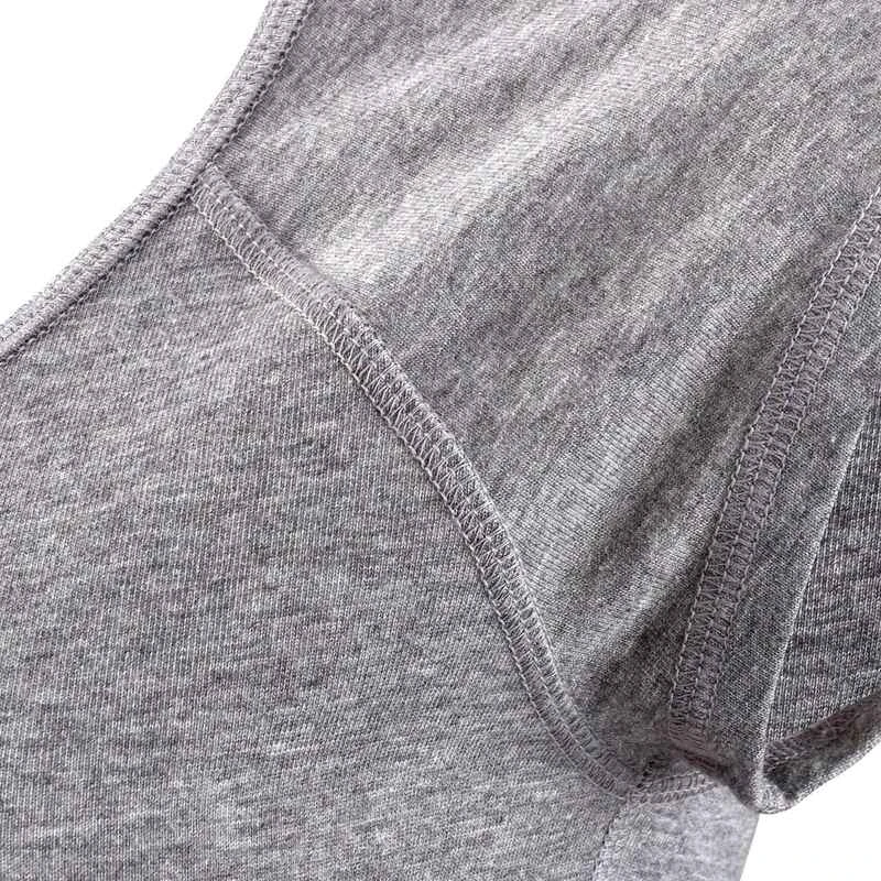 T-Shirt 500 Slim Pilates Gym Douce Femme Gris Chiné 7 T-Shirt 500 Slim Pilates Gym Douce Femme Gris Chiné – Image 5