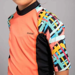 TEE SHIRT ANTI UV FILLE MANCHES COURTES SURF 500 ROSE -ProSportif Boutique top solaire fille manche courte quartz rose 2